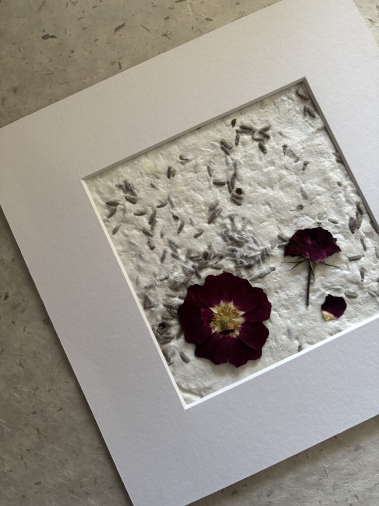 White mounted floral art picture